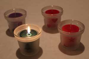 four pure beeswax votive candles in red and green for Christmas