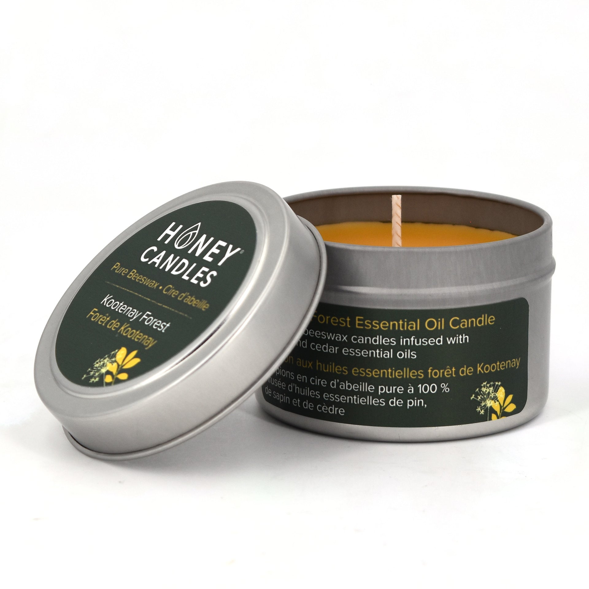 https://www.honeycandles.com/cdn/shop/files/KootenayForestBeeswaxCandleTinOpen.jpg?v=1697140690&width=1920